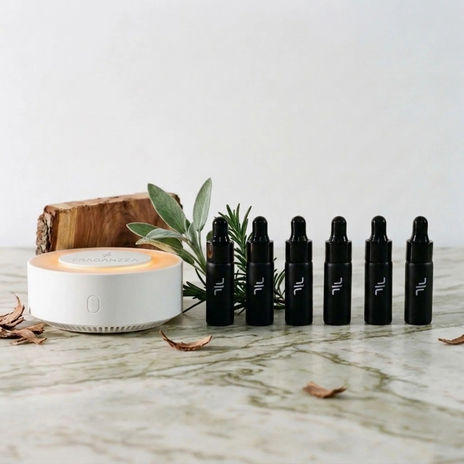 Fraganzza Aroma Herbal & Woody sample fragrance collection with diffuser, rosemary, sage and natural wood